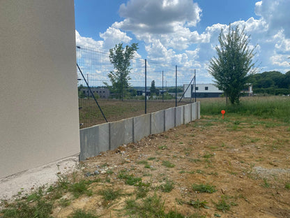 Mur de soutènement en palis grès