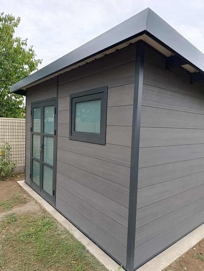 Cour en enrobé à chaud noir | Abri de jardin en composite